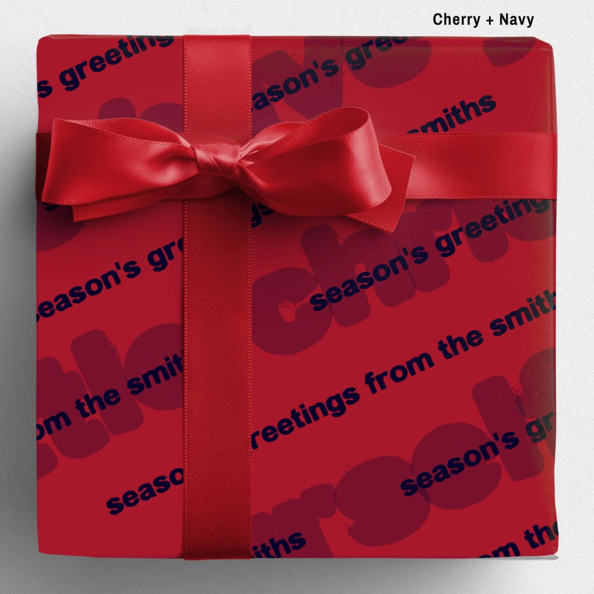 labelled cherry+navy Sseason's Greetings Wrapping Paper Mockup Template August2026
