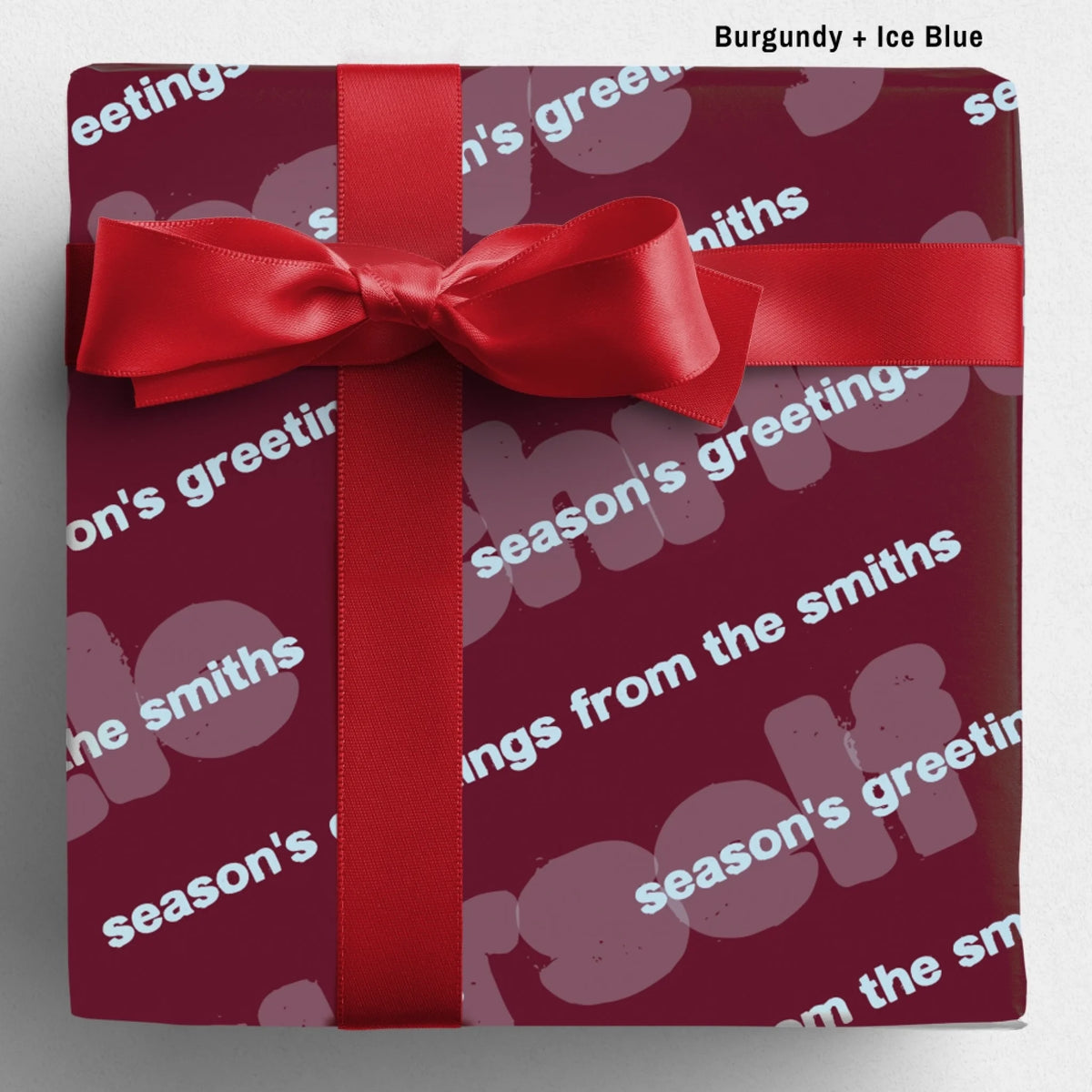 labelled burgundy+iceblue Sseason's Greetings Wrapping Paper Mockup Template August2026