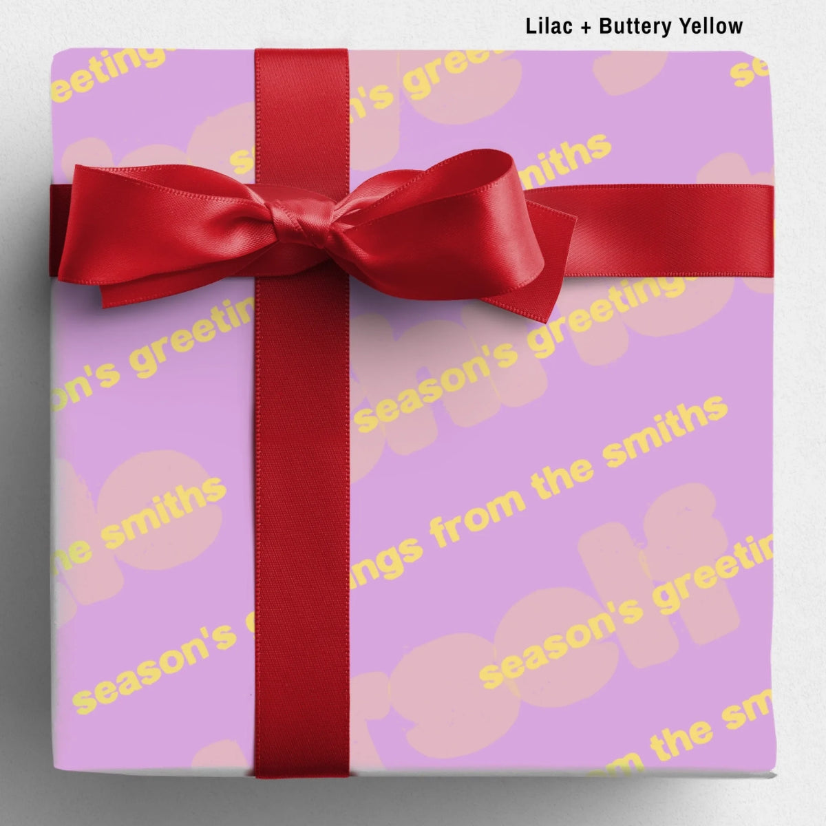 labelled lilac+butteryellow Sseason's Greetings Wrapping Paper Mockup Template August2026