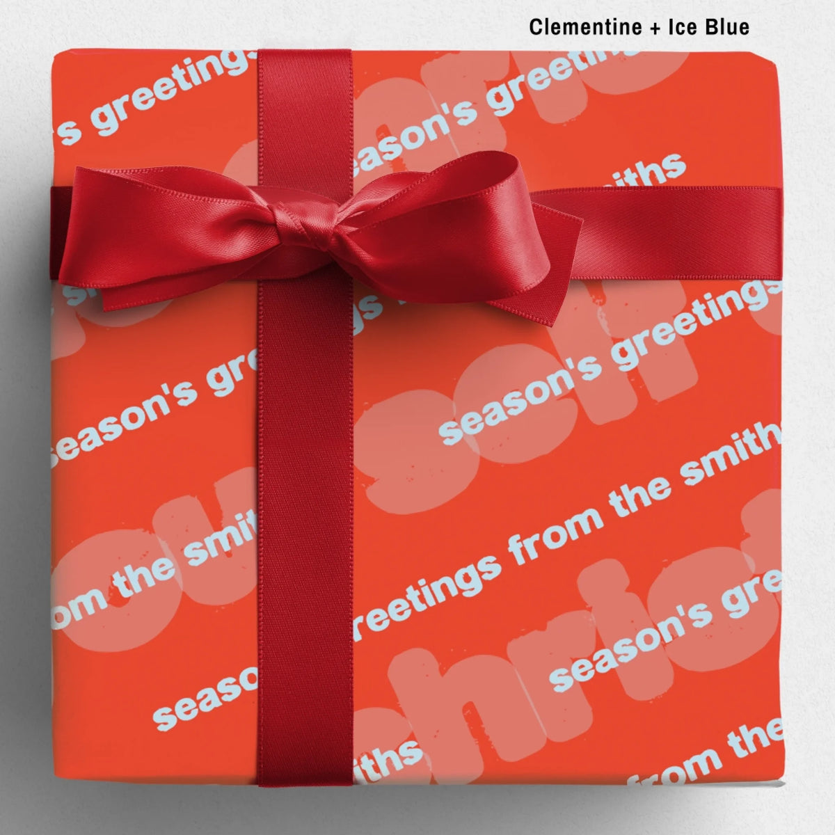labelled clementine+iceblueSseason's Greetings Wrapping Paper Mockup Template August2026