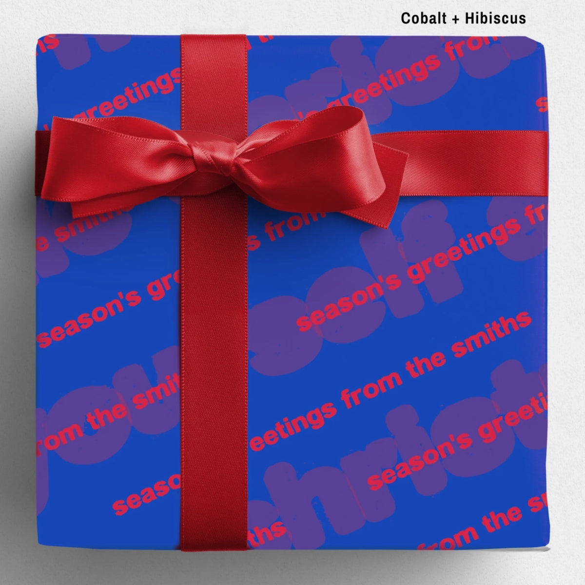 labelled cobalt+hibiscus Sseason's Greetings Wrapping Paper Mockup Template August2026