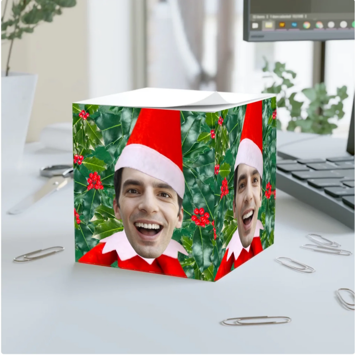 Official Elf Business note cube personalised with a man's face as a Christmas elf