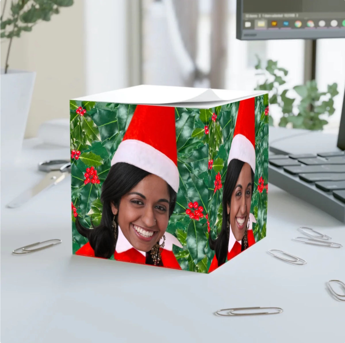 Official Elf Business note cube personalised with a long-haired woman's face as a Christmas elf