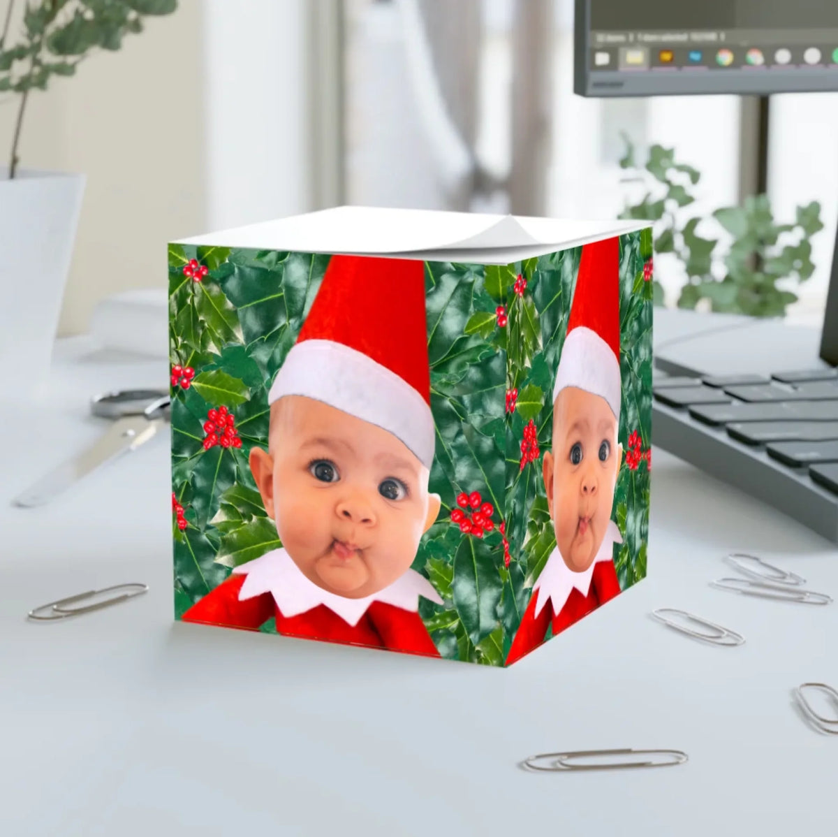 Official Elf Business note cube personalised with a baby's face as a Christmas elf